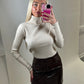 Beige fine knit ribbed polo neck jumper