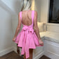 Pink bow back skater dress